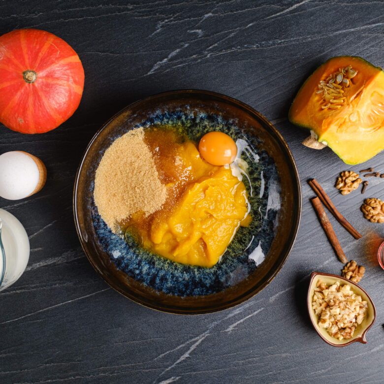 pumpkin pancakes wet ingredients in a bowl.