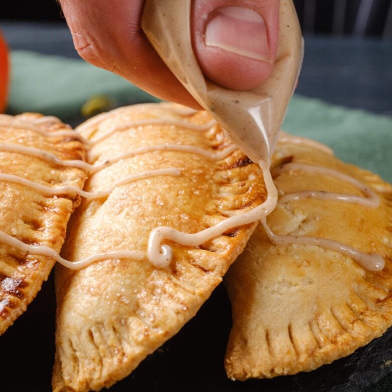 pumpkin pasties drizzled with glaze.