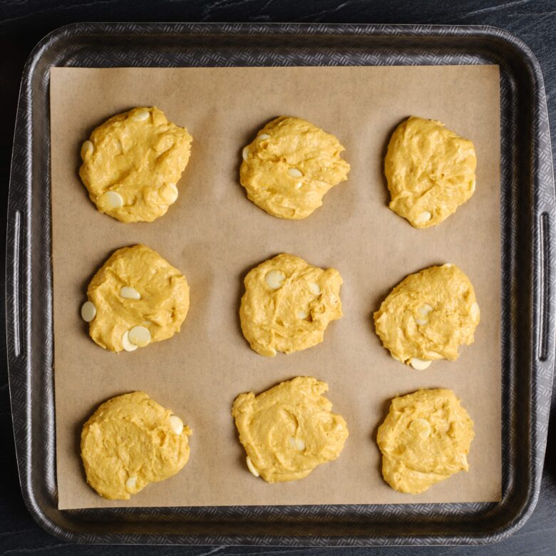 pumpkin spice cookies on baking sheet.