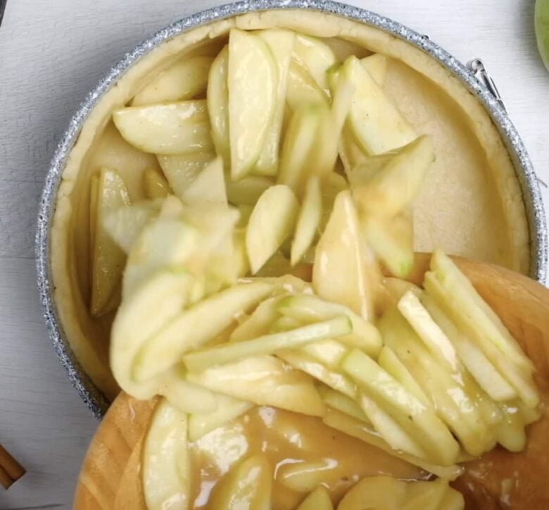 apple pie filing going into bottom crust.