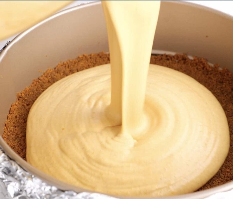 Pumpkin Cheesecake Filling Poured into Crust.