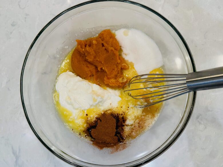 pumpkin cake wet ingredients in a bowl.