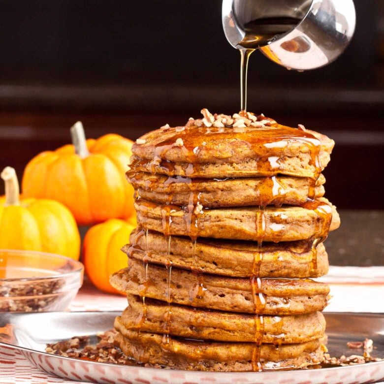 Fluffy Pumpkin Pancakes with Maple Syrup.