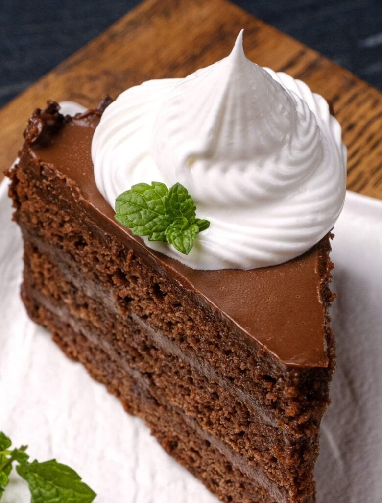 stabilized whipped cream on chocolate cake.
