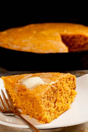 slice of sweet potato cornbread with butter.