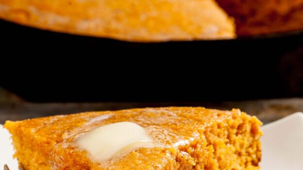 slice of sweet potato cornbread with butter.