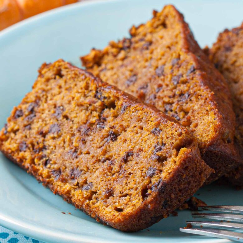 vegan pumpkin bread slices on a plate.