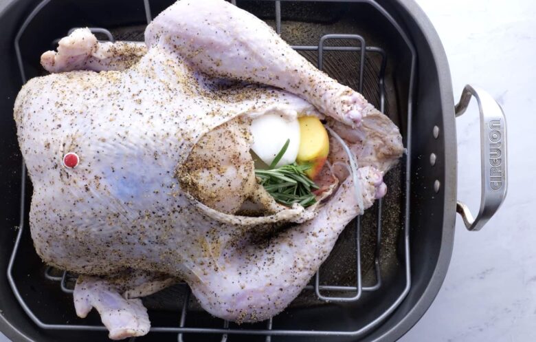 brine roasted turkey stuffed with aromatics.