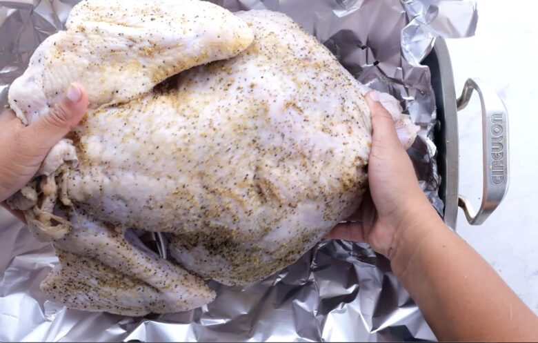 brine roasted turkey on foil lined pan.