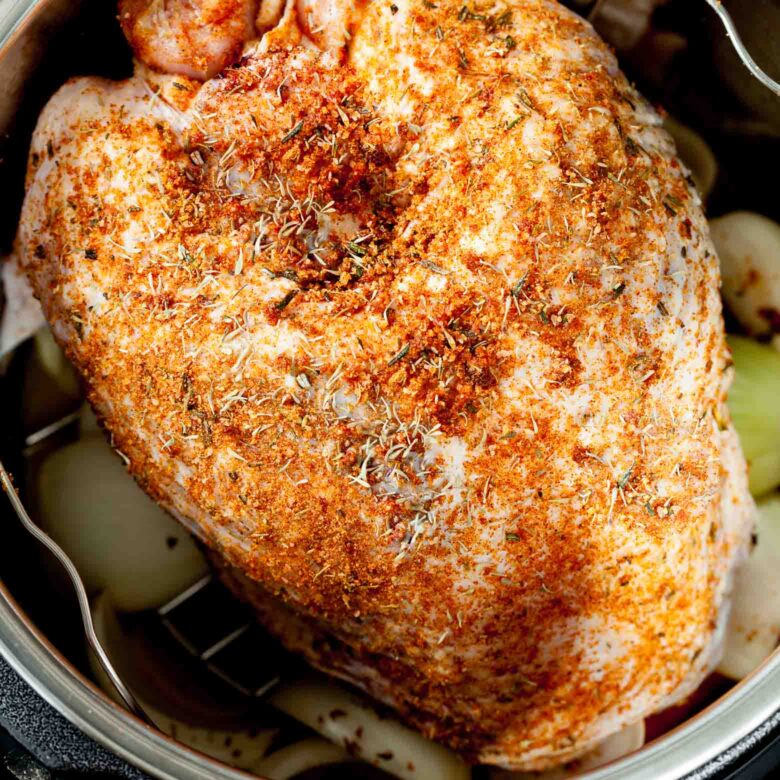 instant pot raw turkey breast in pot.