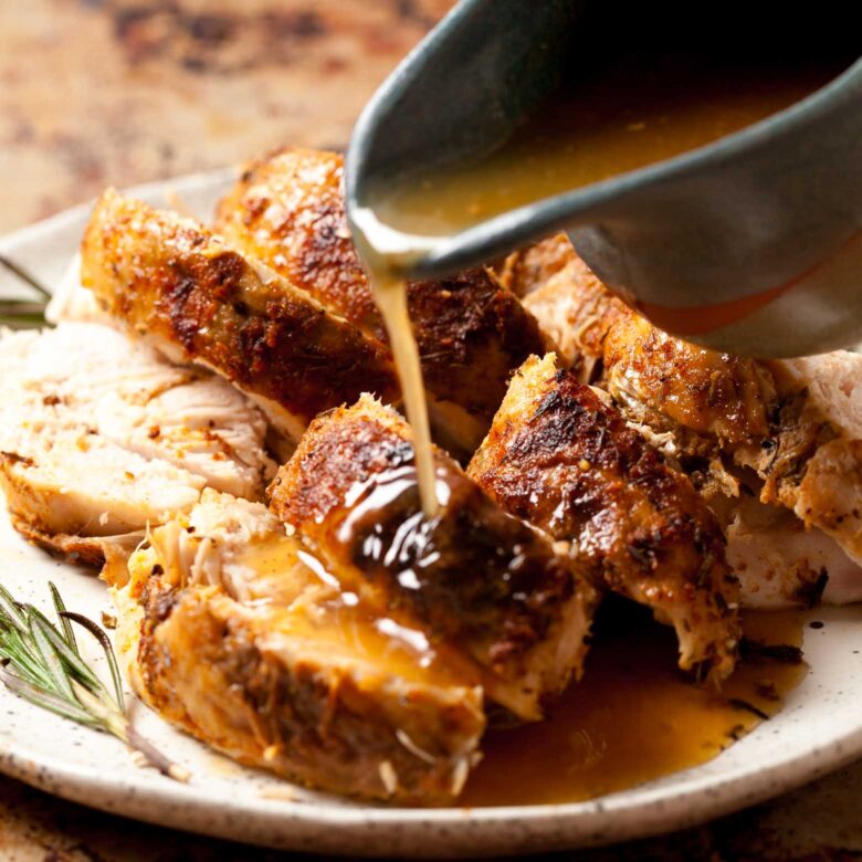 instant pot turkey breast sliced with gravy.