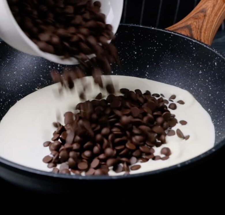 chocolate kahlua cake ganache being made.