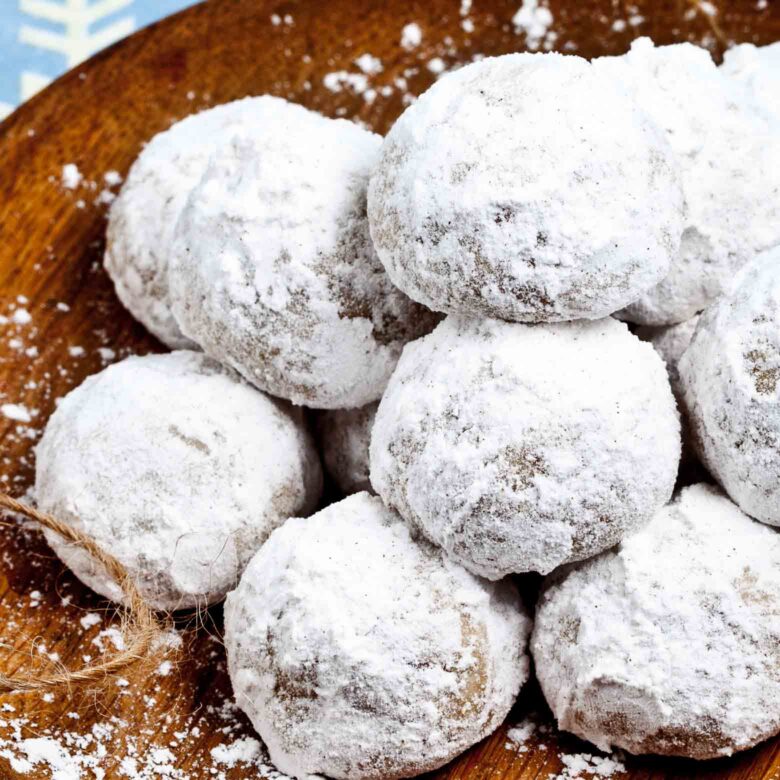 snowball cookies finished on a plate.