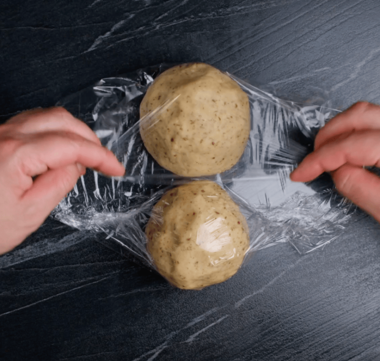 snowball cookies dough split in half.