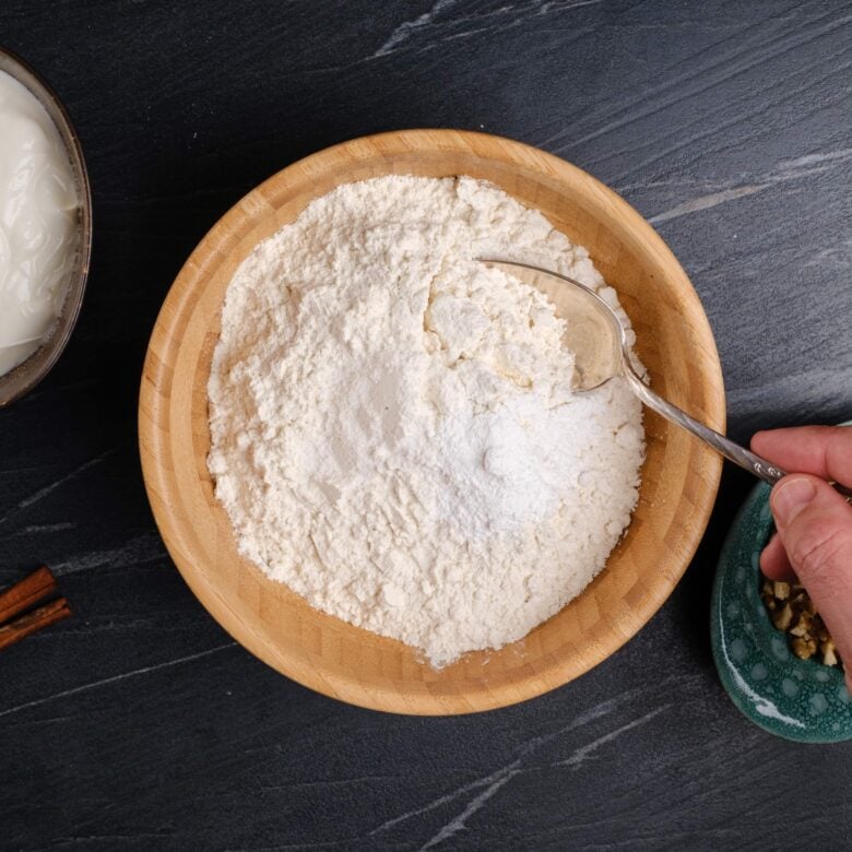 sour cream coffee cake dry ingredients in a bowl.