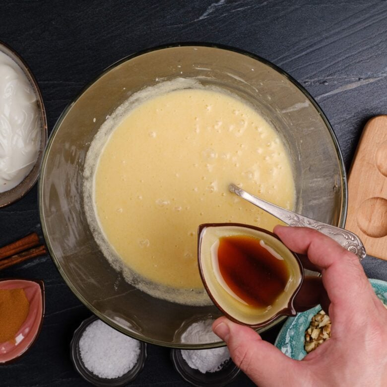 sour cream coffee cake vanilla being added.