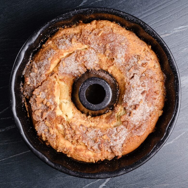 fully baked sour cream coffee cake in Bundt pan.