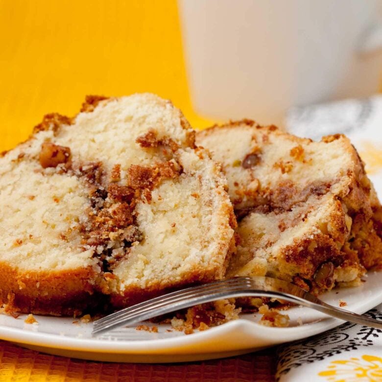 sour cream coffee cake sliced and plated.