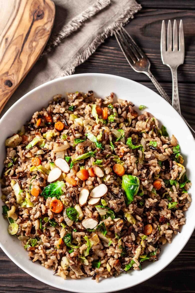 Wild rice pilaf iin a bowl with spoon.