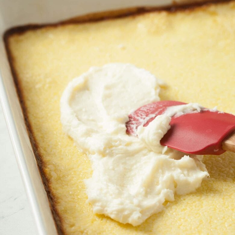 almond bars frosting being spread.