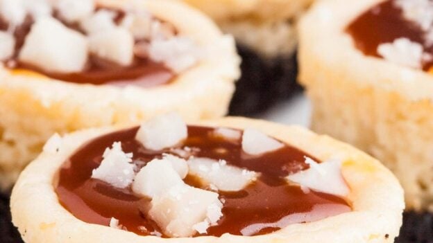 caramel cheesecake bites baked and garnished.