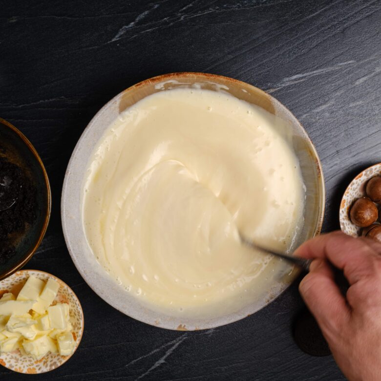 salted caramel cheesecake bites filling being mixed.