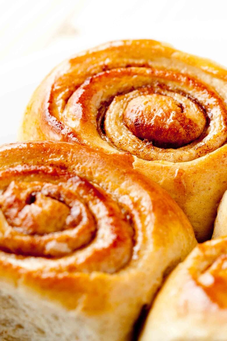 Closeup shot of freshly baked cinnamon rolls without icing.