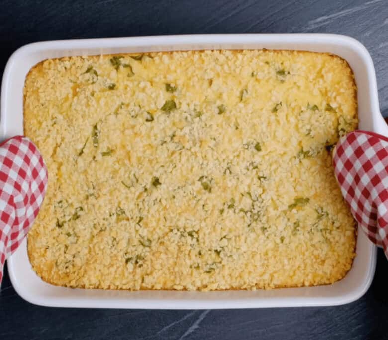 Easy corn casserole fresh out of the oven featuring a beautiful golden color.