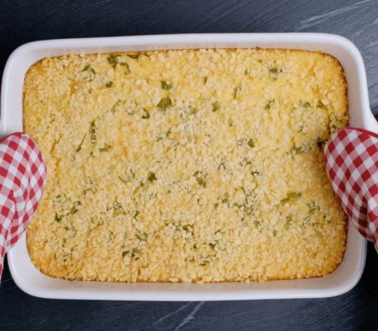 Easy corn casserole fresh out of the oven featuring a beautiful golden color.