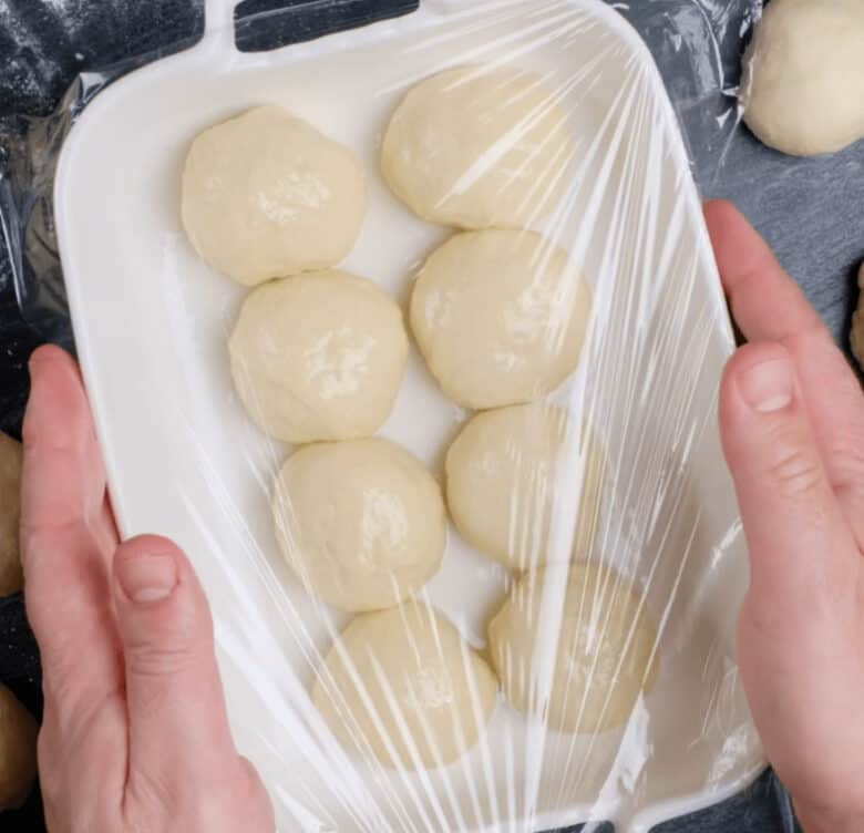 formed dinner rolls rising