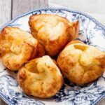 Popovers on a plate.