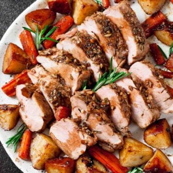 Sheet pan pork tenderloin served on a plate.