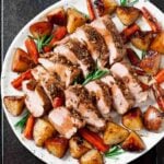 Sheet pan pork tenderloin served on a plate.