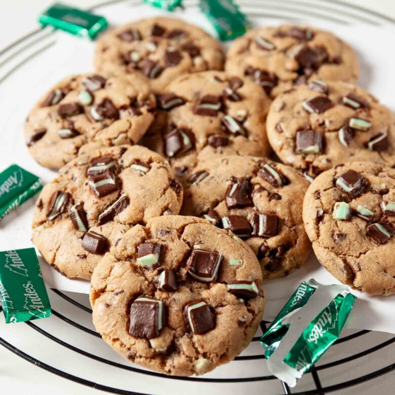 Andes mint cookies stacked on a plate.