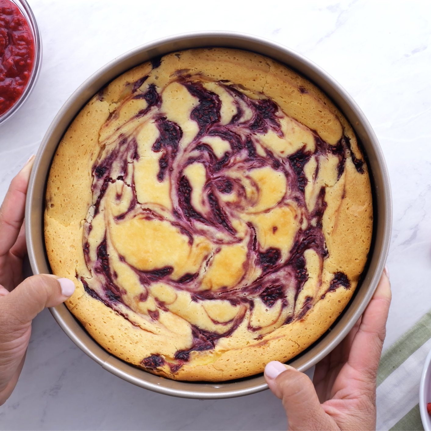 A freshly baked raspberry cheesecake.