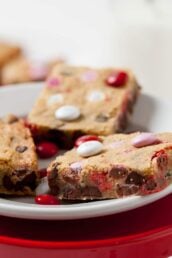 finished blondies cookie bars with chocolate chips on a plate.