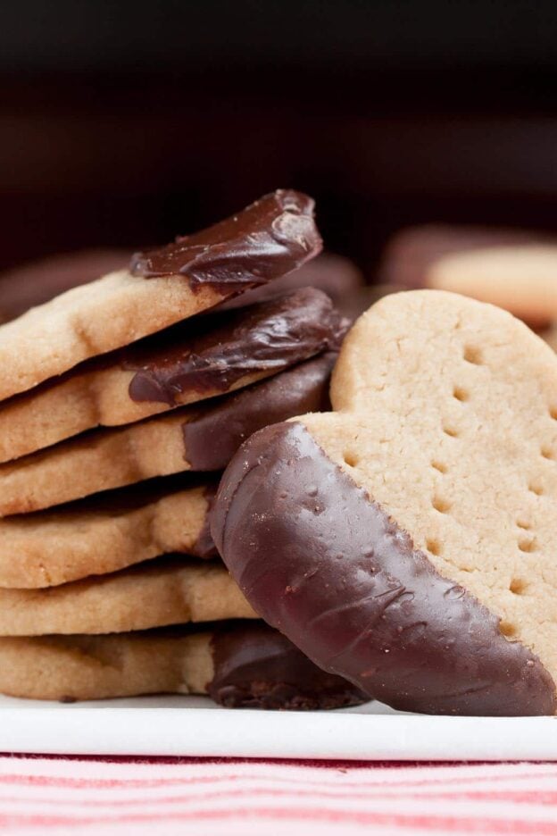 chocolate dipped shortbread cookies stacked.