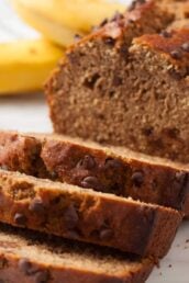 Sliced dairy-free banana bread with chocolate chips.