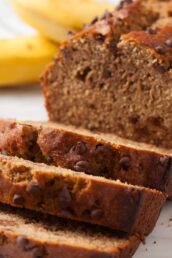 Sliced dairy-free banana bread with chocolate chips.