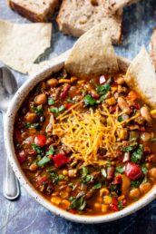 garnished vegetarian chili in a bowl.