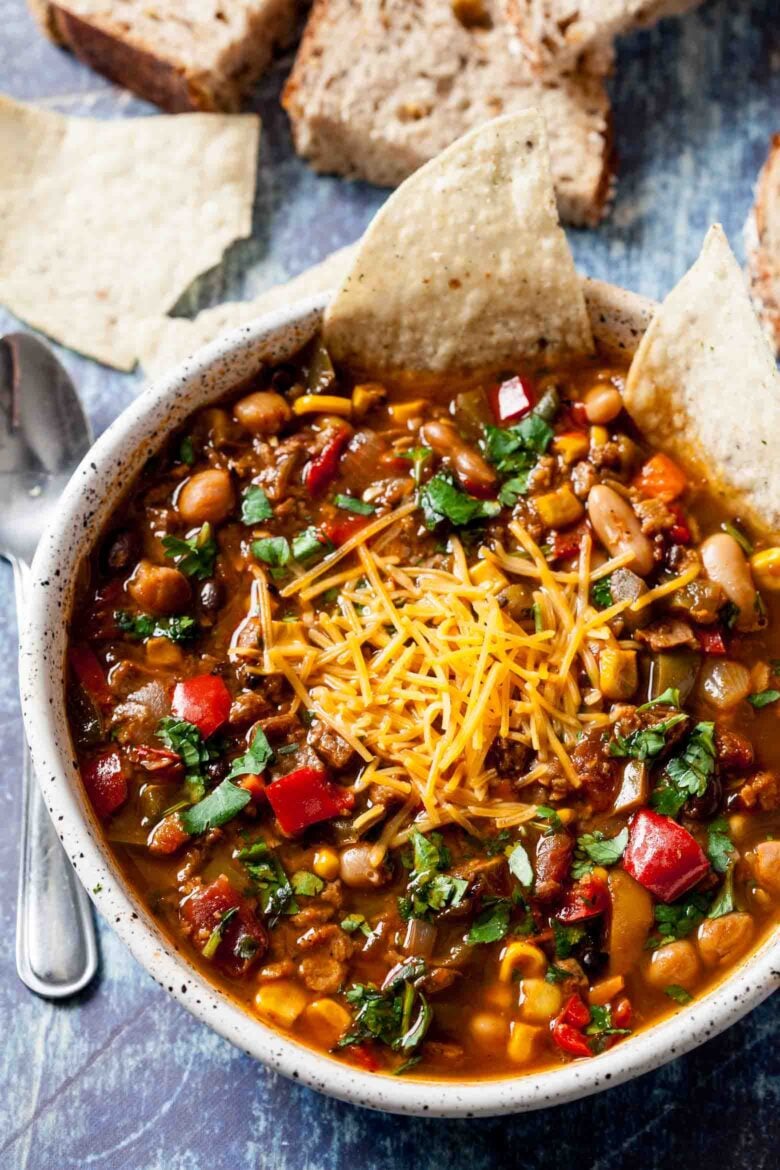 garnished vegetarian chili in a bowl.