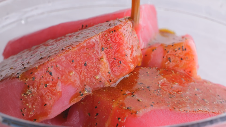 marinade poured over ahi tuna.