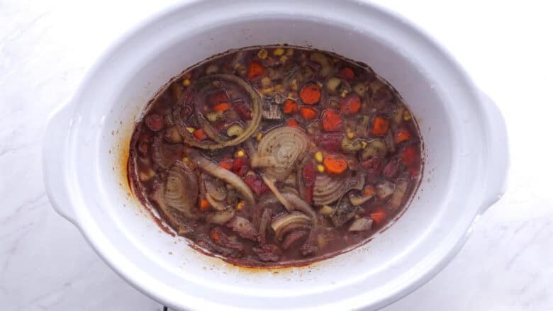beef and barley stew cooking in the slow-cooker.