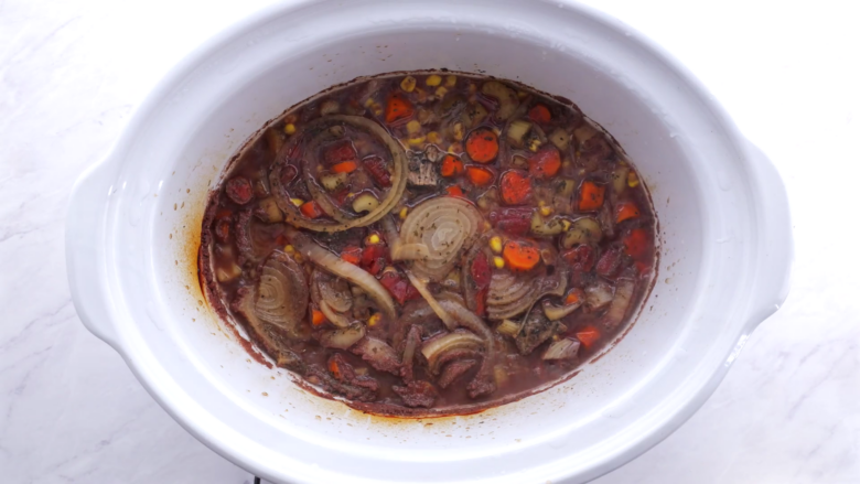 beef and barley stew cooking in the slow-cooker.