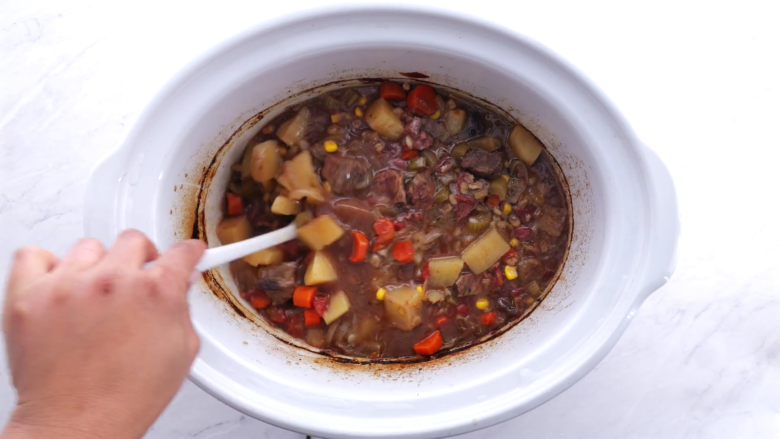 finished beef and barley stew in slow-cooker.