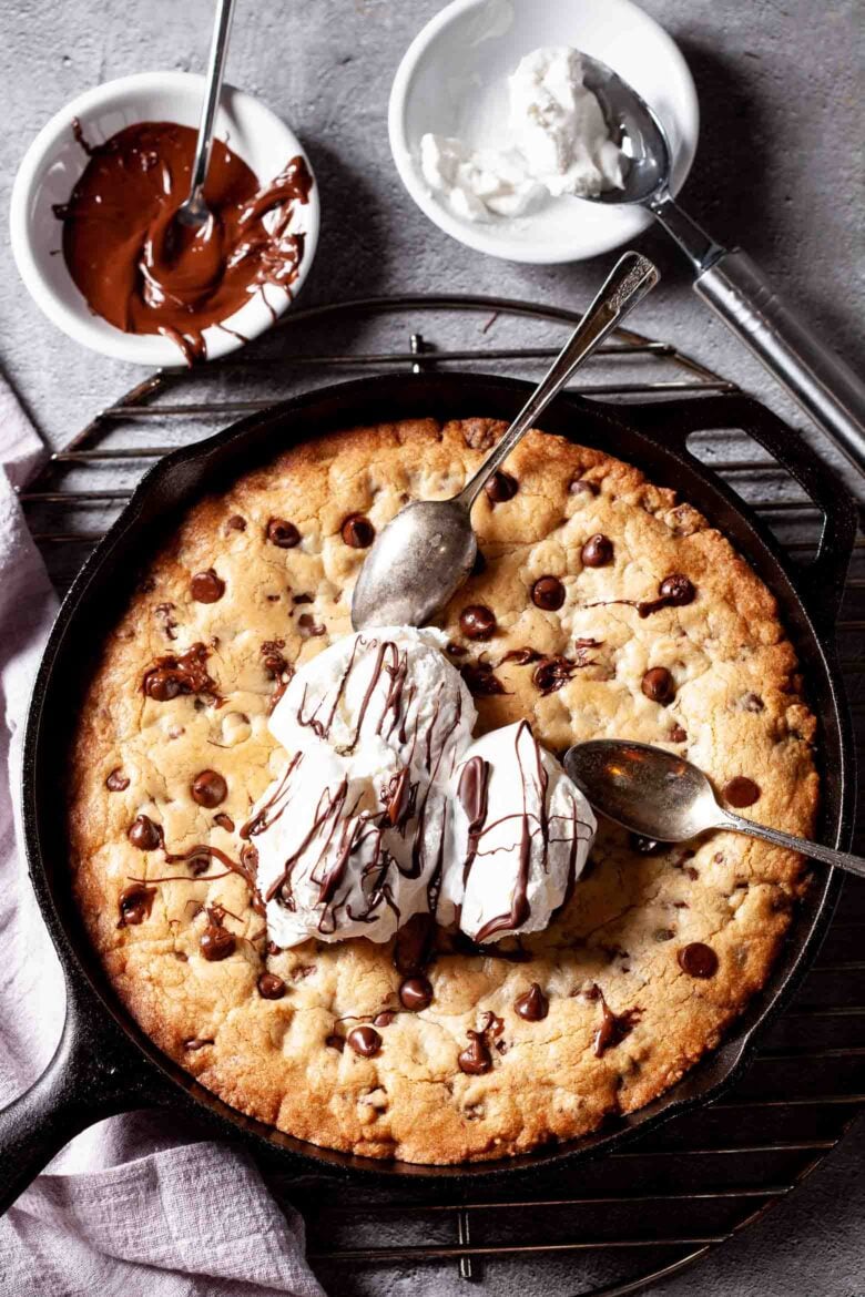 skillet chocolate chip cookie cake in cast iron pan.