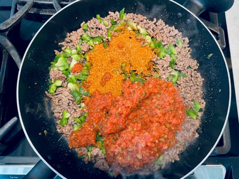 ground beef and taco seasonings in a pan. 