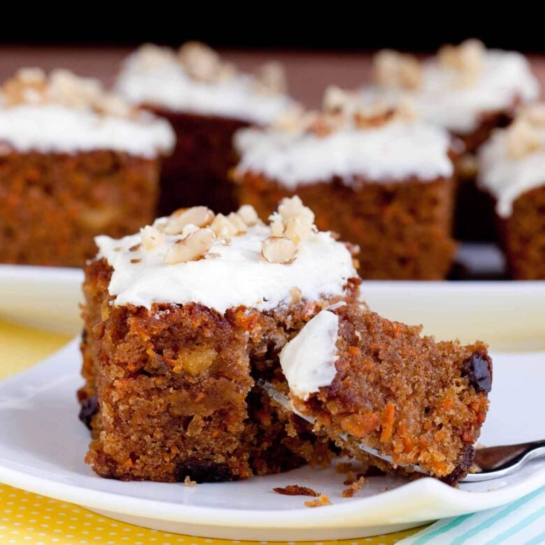 Slice of easy carrot cake with cream cheese frosting.