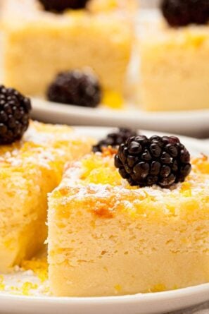 lemon custard cake plated and garnished close up.