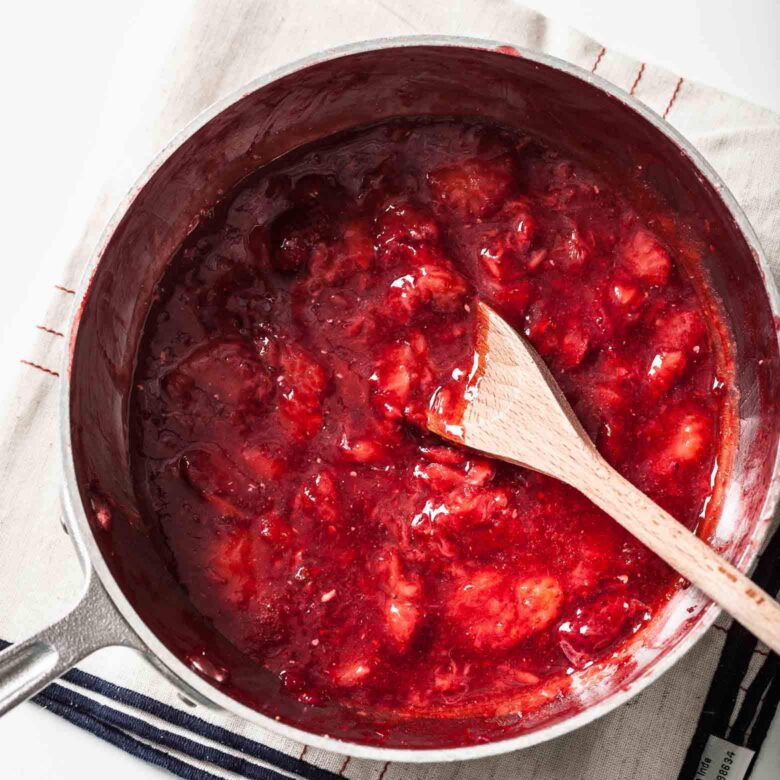 strawberry sauce cooking in pan.